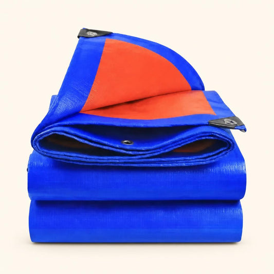 Lona impermeable multiuso azul y naranja doblada